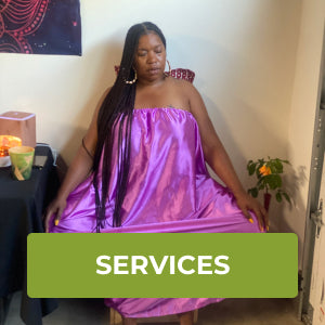 Woman wearing a long pink gown that covers her body taking part in a vaginal steaming session. There is a Services button on the image.